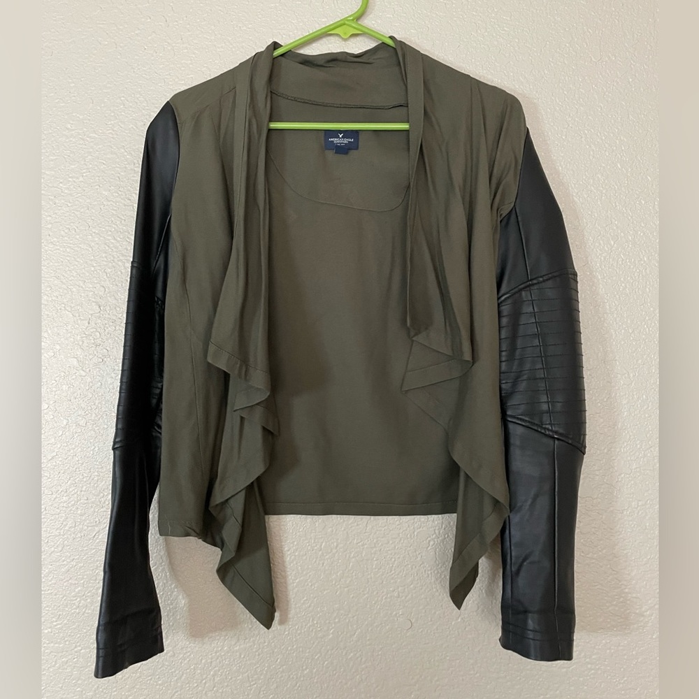 XS American Eagle leather sleeve jacket in green.